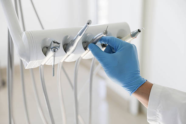 Professional Invisalign Clear Aligners technician working in Menard, TX